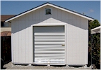 14' x 24' w/ roof overhang & 6' wide steel roll-up door